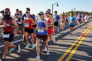 Group of runners on bridge